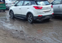 बारिश ने खोली विकास कार्यों की पोल, हाईवे पर बने गड्डे barish in faridabad